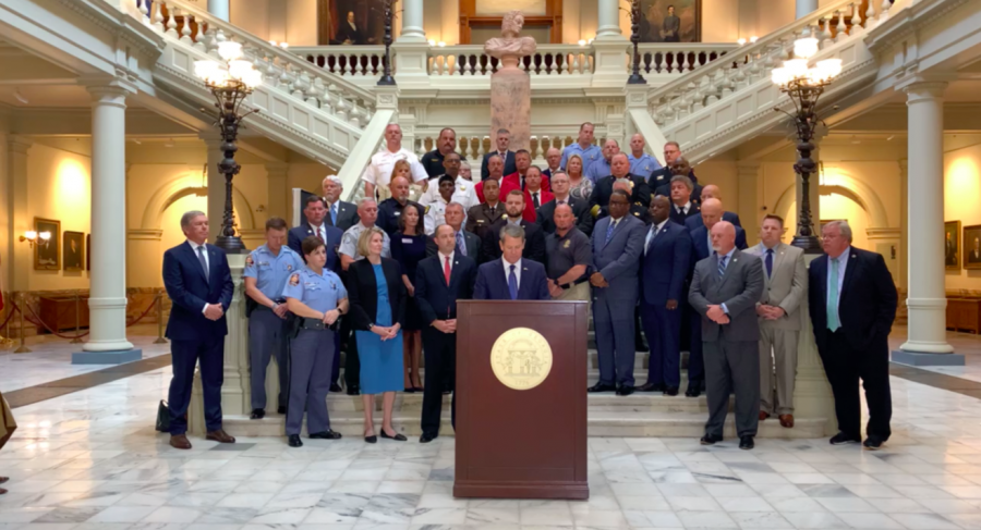 Gov. Brian Kemp surrounded by law enforcement leaders at the state capitol September 27, 2021