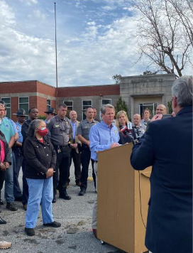 Kemp addresses the crowd at the old Baldwin County Health Department for a media briefing